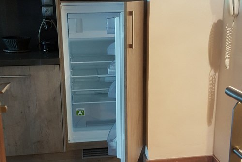 Entretien du frigo (nettoyage et dégivrage) d'un appartements de montagne situé à Belley